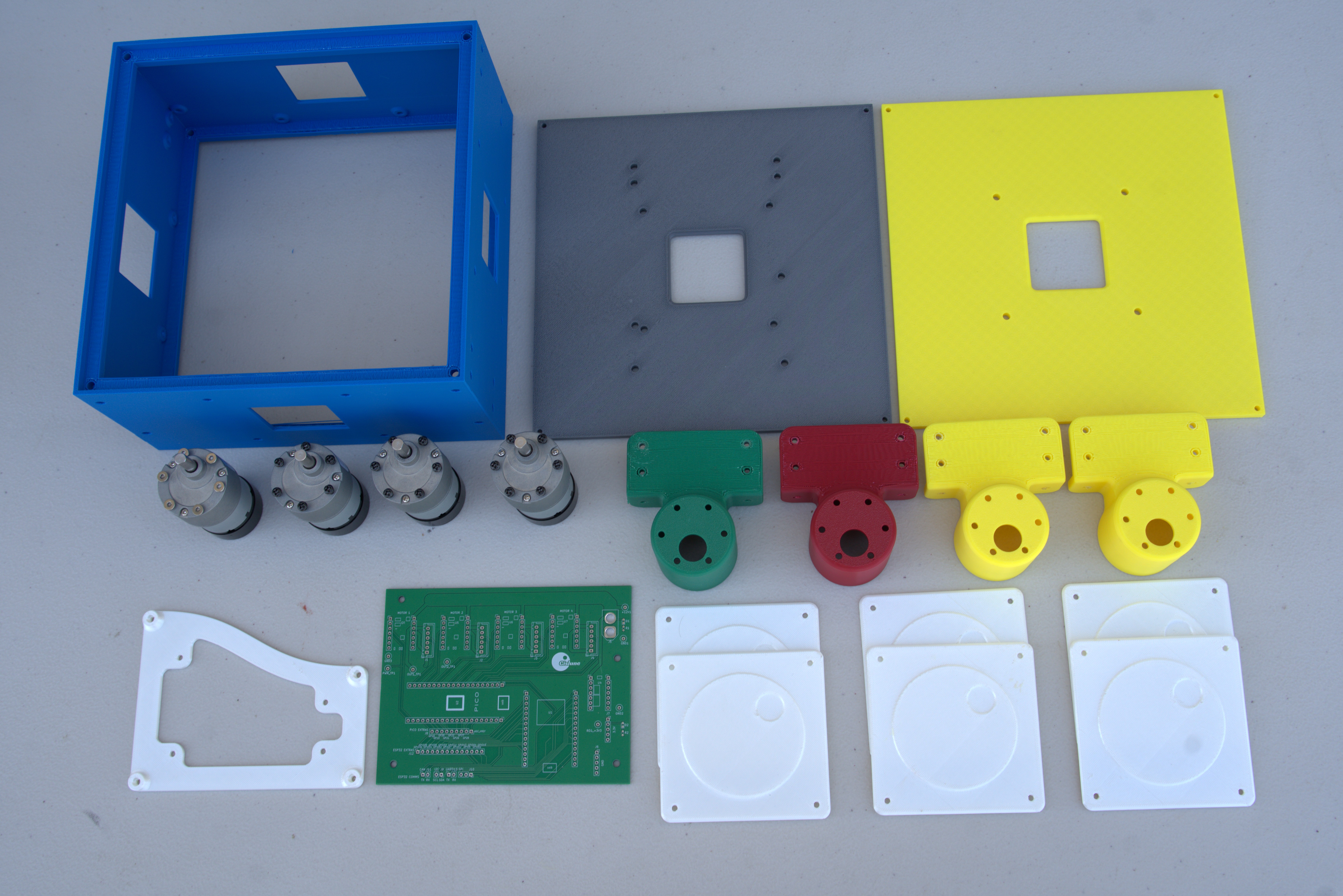 CARVE Core chassis parts, PCB, and motors before assembly