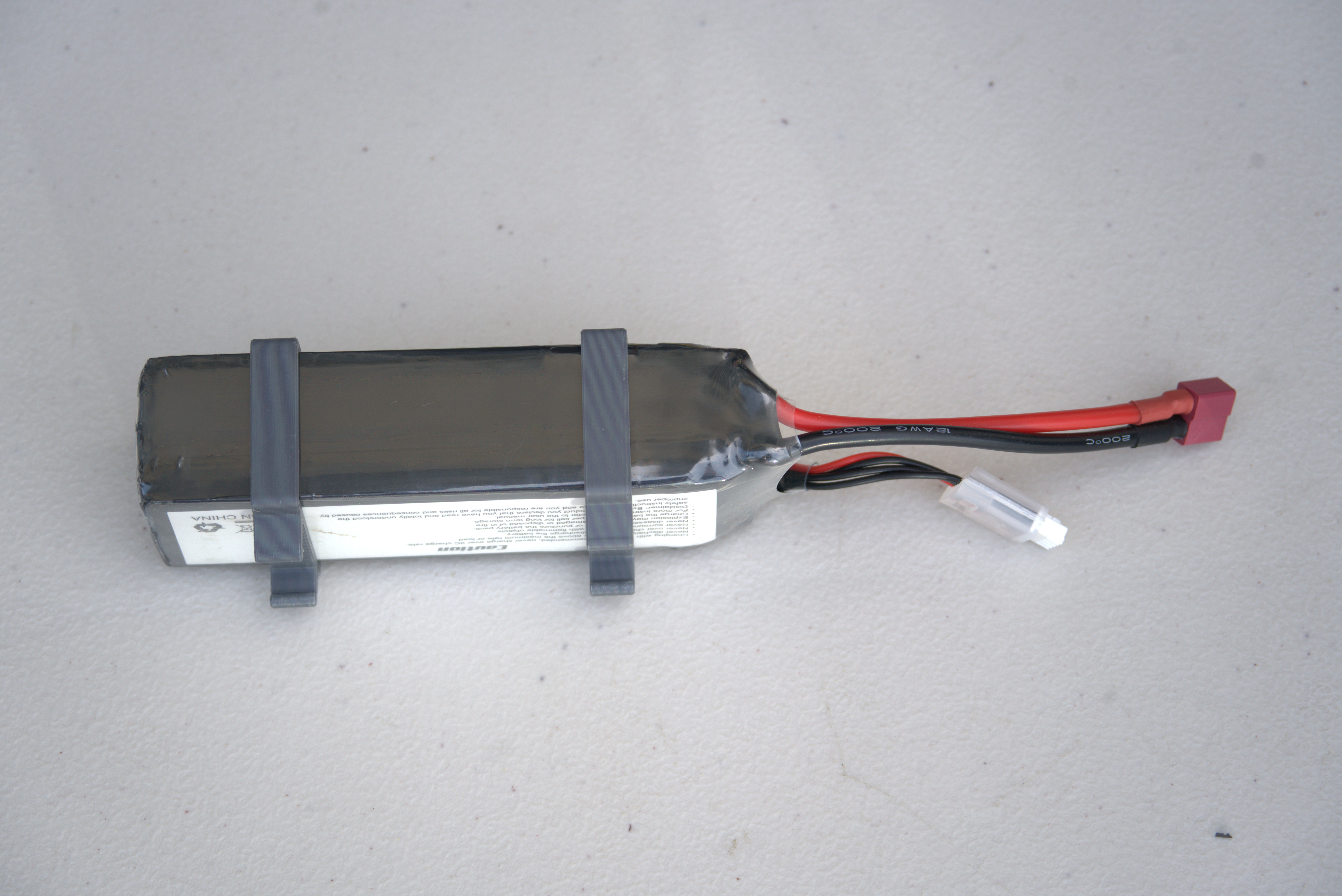 Battery clips installed on the battery
